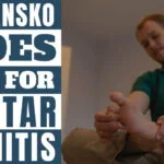 Person stretching his feet with are dansko shoes good for plantar fasciitis written in blocks