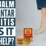 Picture of person holding heel in pain with tiger balm for plantar fasciitis does it really work written in blocks